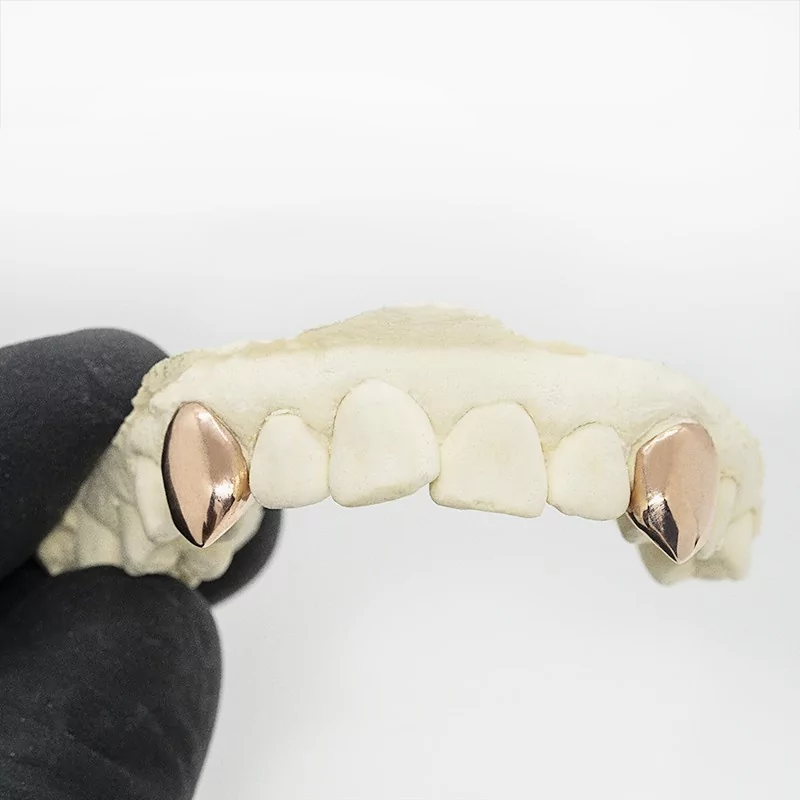 Achetez le bijoux Grillz 2 dents vampire - Or rose 18K chez Dreamgold Paris